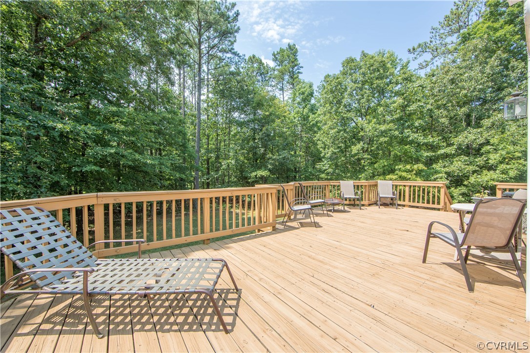 1841 Covington Road Crozier, VA 23039 - Photo 19 of 50 a view of a chairs on wooden deck