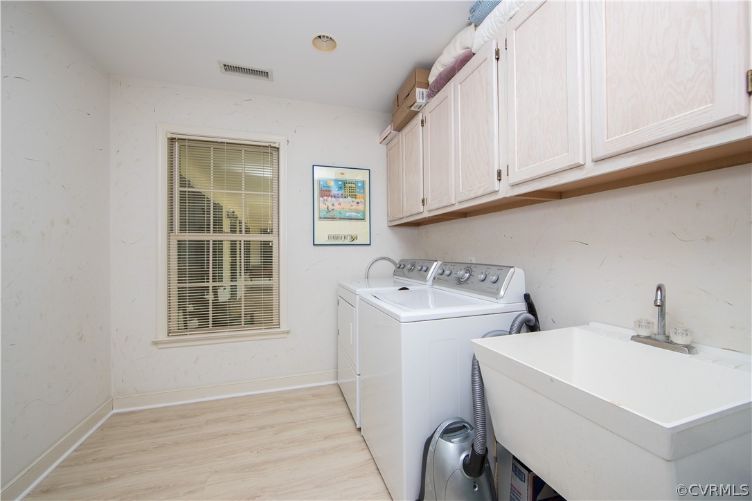1841 Covington Road Crozier, VA 23039 - Photo 21 of 50 a utility room with dryer and washer