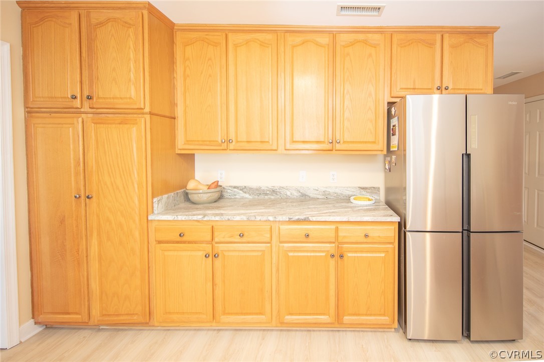 1841 Covington Road Crozier, VA 23039 - Photo 29 of 50 a white refrigerator freezer sitting in a kitchen