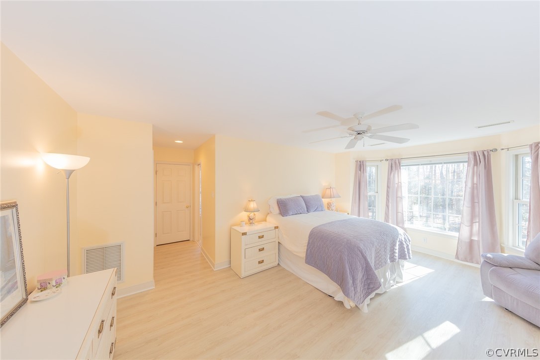 1841 Covington Road Crozier, VA 23039 - Photo 33 of 50 a spacious bedroom with a bed and a large window