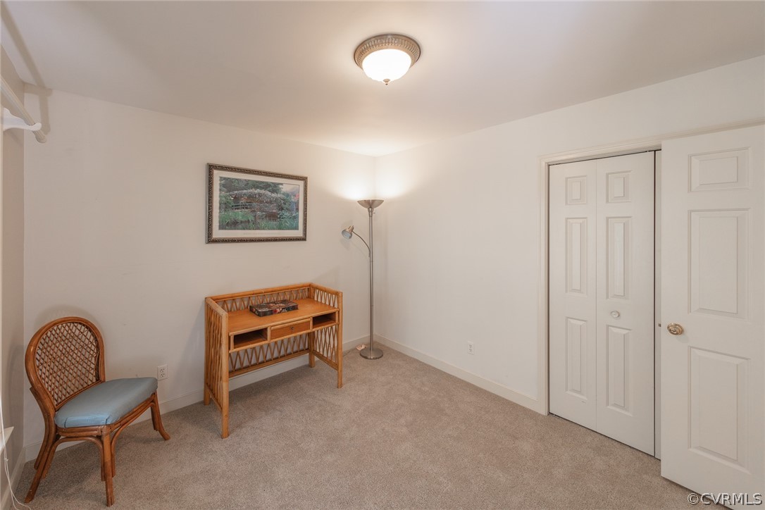 1841 Covington Road Crozier, VA 23039 - Photo 38 of 50 a bedroom with a bed and a chair