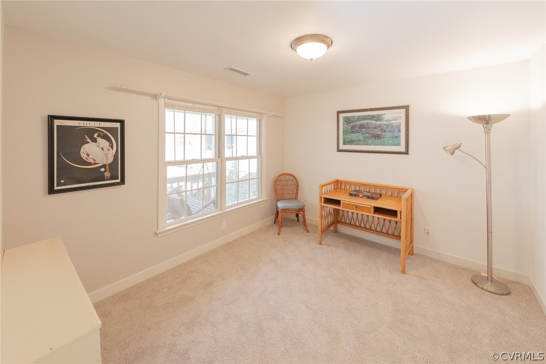 1841 Covington Road Crozier, VA 23039 - Photo 39 of 50 a living room with furniture and a window