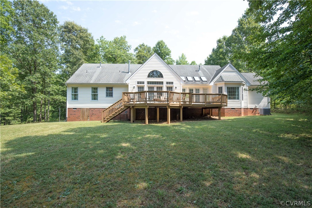 1841 Covington Road Crozier, VA 23039 - Photo 49 of 50 a front view of a house with a garden and trees