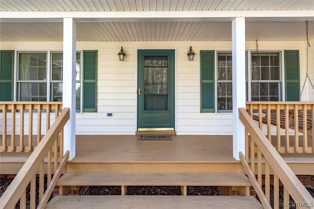 1841 Covington Road Crozier, VA 23039 - Photo 6 of 50 front view of a house with a porch