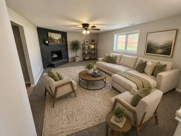 a living room with furniture and a fireplace