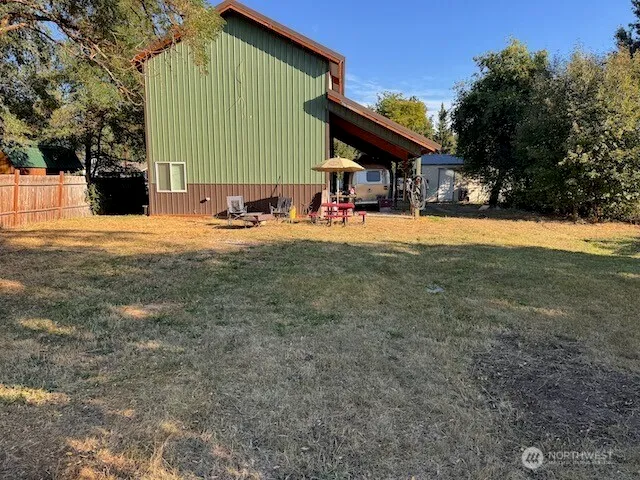 a view of a chair and table in the patio