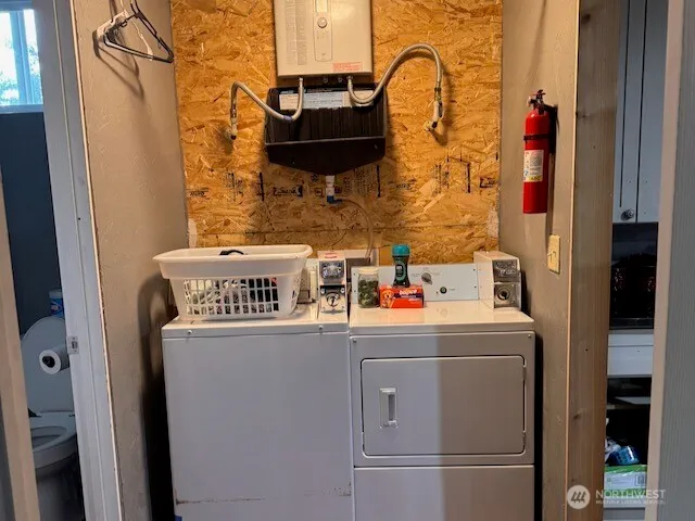 a utility room with dryer and washer