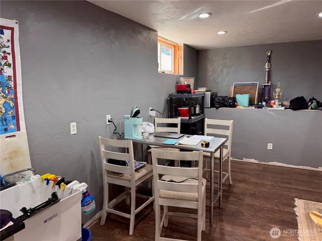 a view of a workspace with furniture