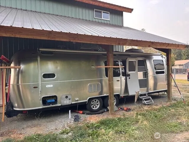 a view of car parked in front of house