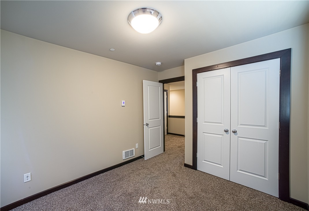 604 Morris Avenue South Renton, WA 98057 - Photo 14 of 21 an empty room with closet area