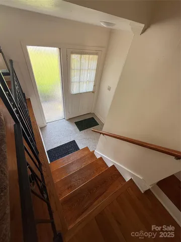 a bedroom with windows