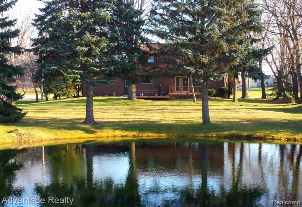 52155 Fairchild Road New Baltimore, MI 48051 - Photo 2 of 32 Pond in the summer