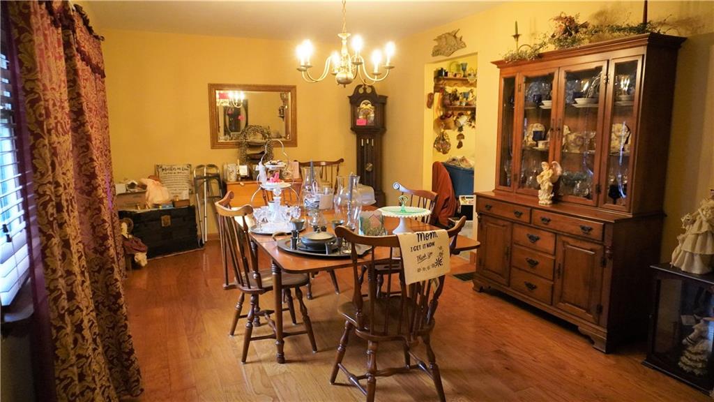 150 Patterson Road Slippery Rock, PA 16057 - Photo 6 of 14 a view of a dining room with furniture and chandelier
