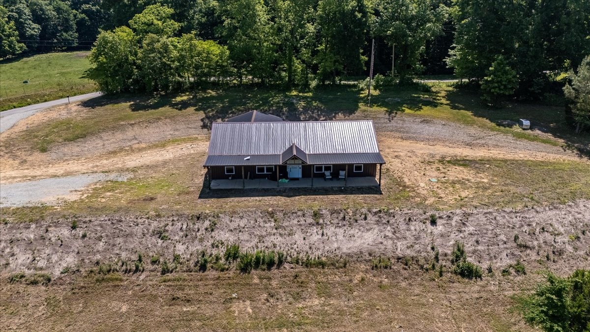 3 Harrison Road Five Points, TN 38457 - Photo 24 of 34 a view of a house with a yard