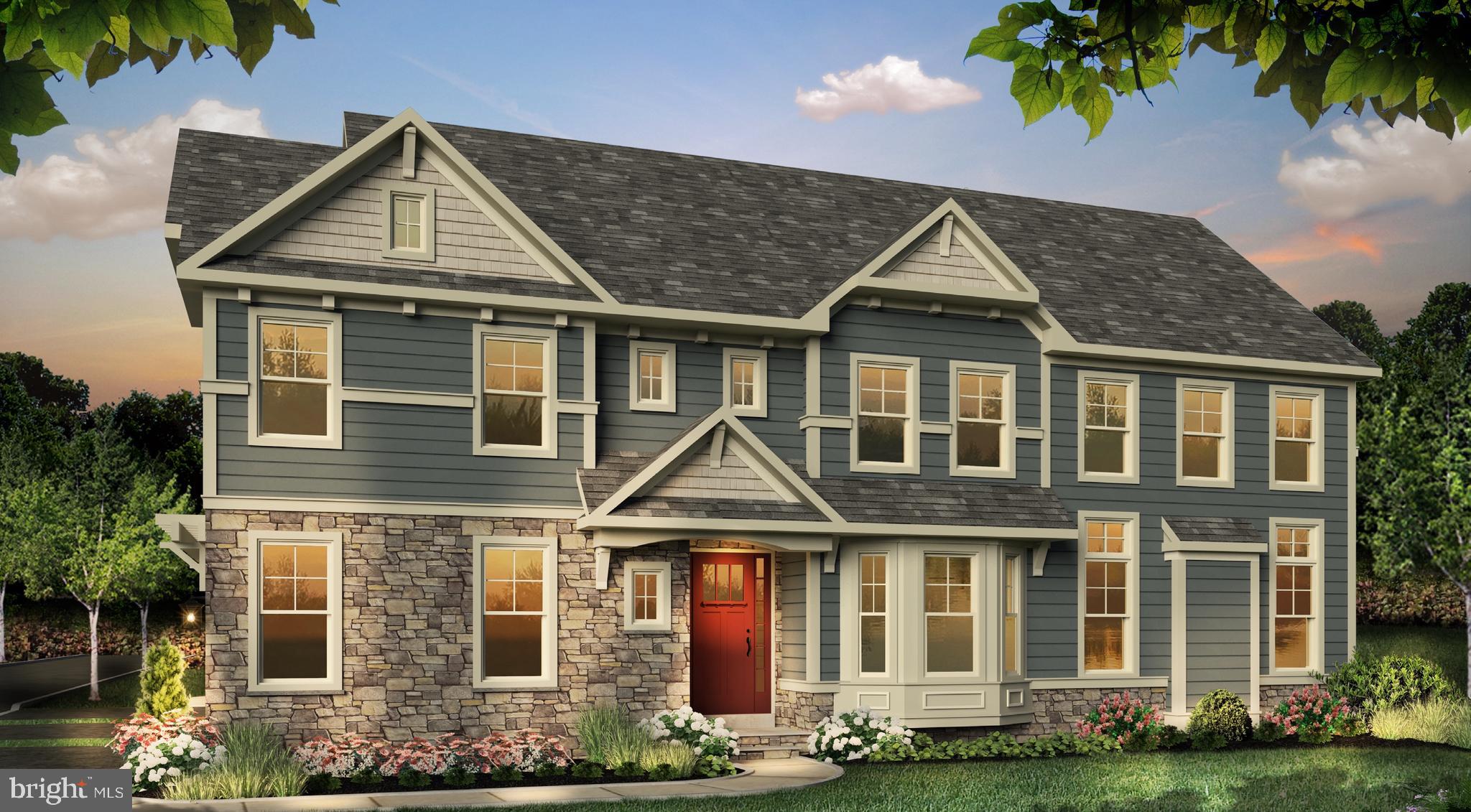 715 Hampton Road, Unit 103 Ambler, PA 19002 - Photo 2 of 27 a front view of a house with garden