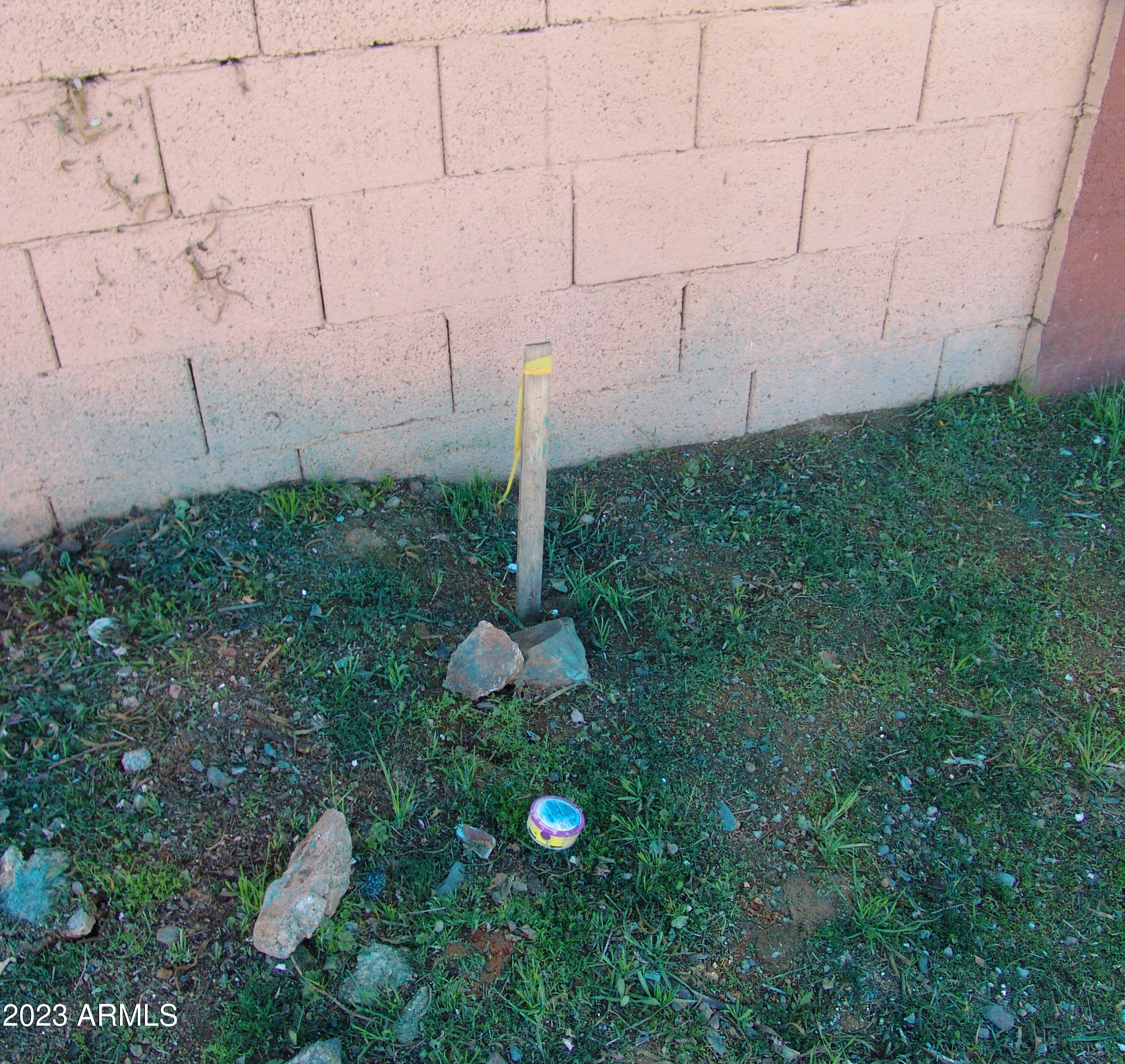 2105 West Elm Street, Unit 1 Phoenix, AZ 85015 - Photo 9 of 9 REAR LOT STAKE EAST CORNER MLS DSC06872