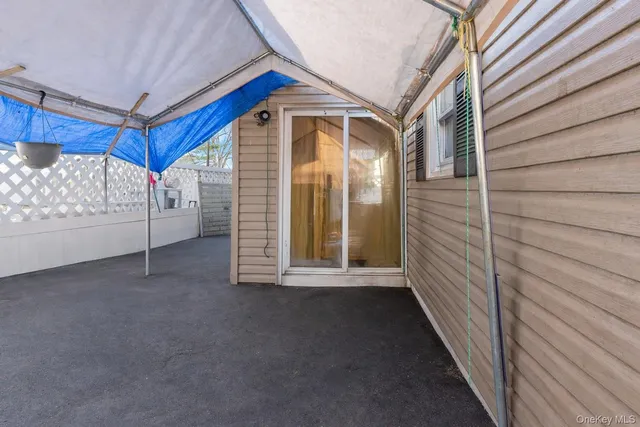 a view of a house with a large window