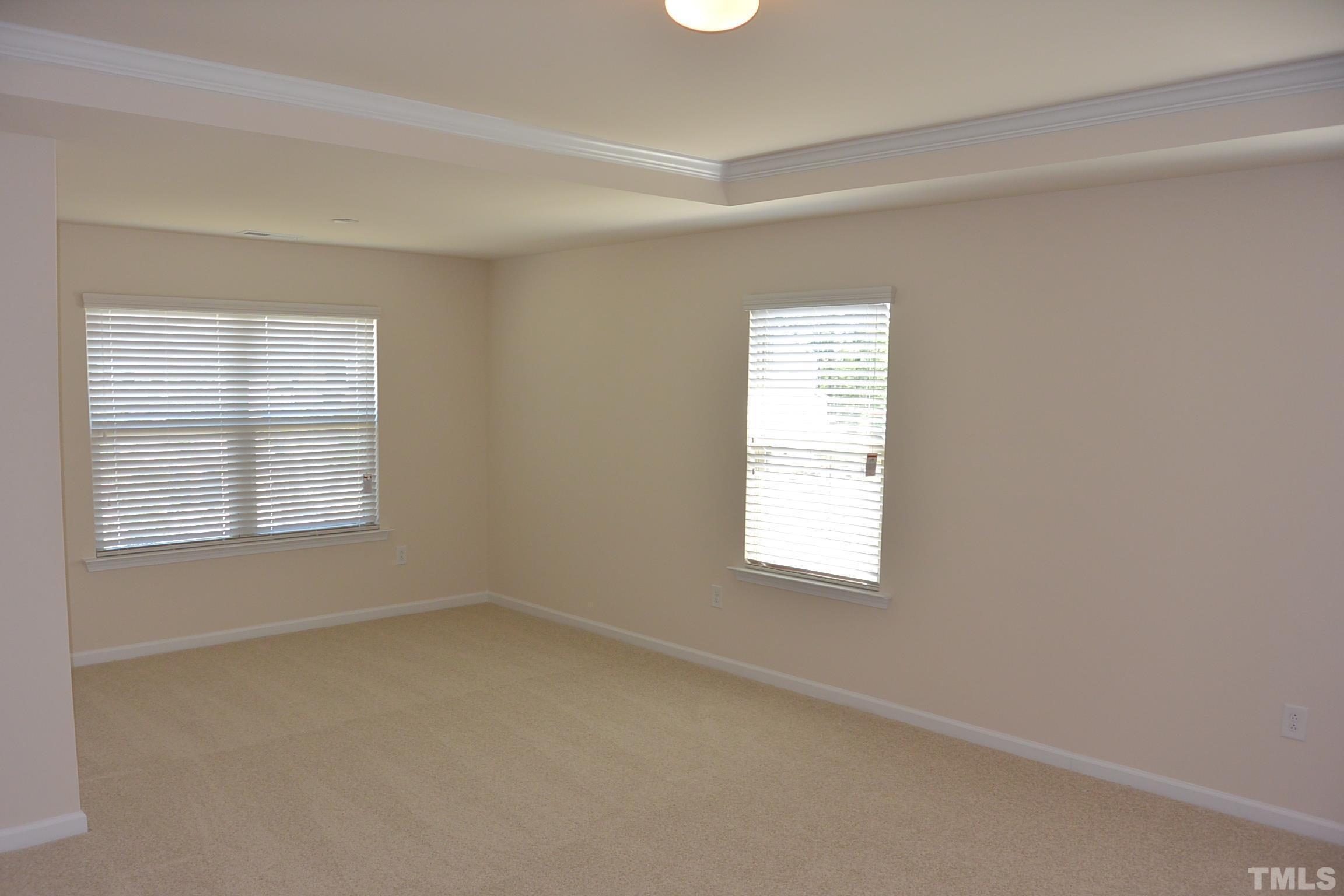249 Tilth Street Cary, NC 27519 - Photo 11 of 18 an empty room with a window