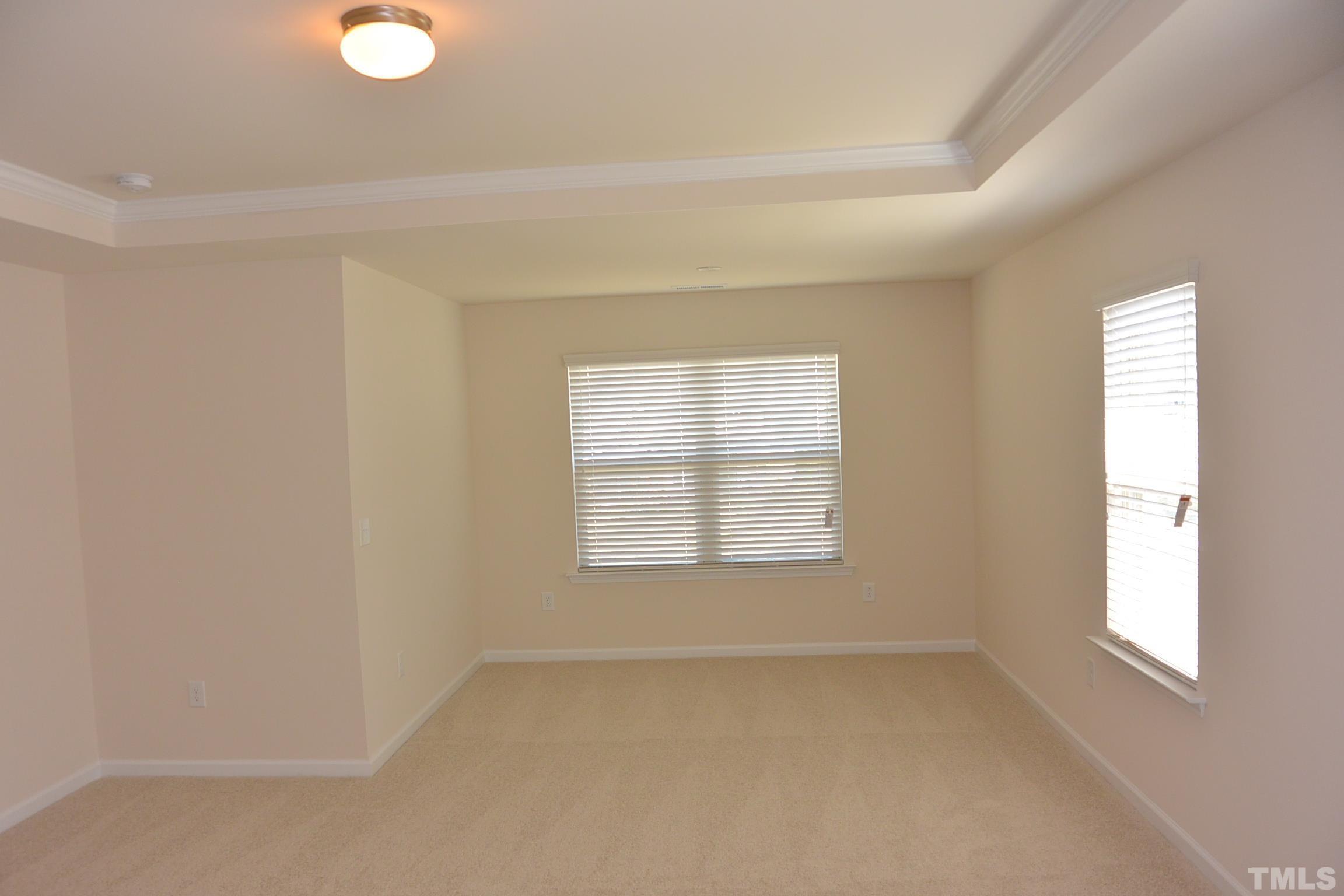 249 Tilth Street Cary, NC 27519 - Photo 12 of 18 an empty room with a window