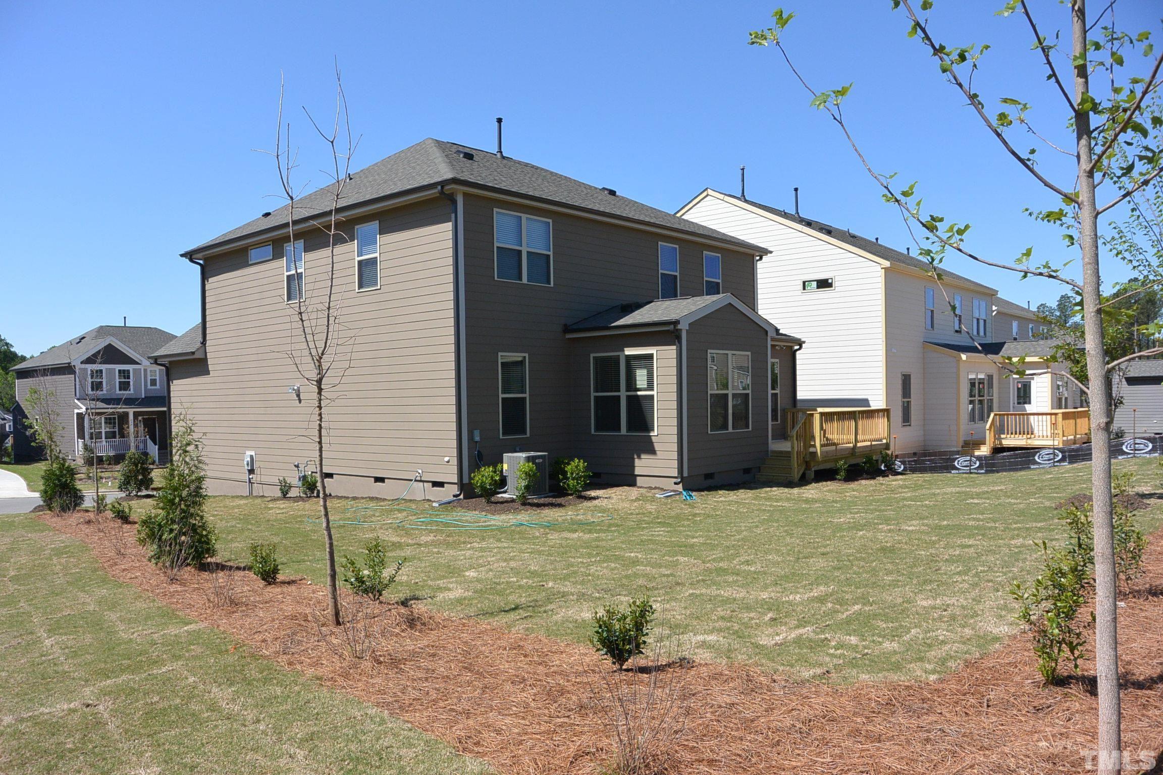 249 Tilth Street Cary, NC 27519 - Photo 3 of 18 a view of a house with backyard