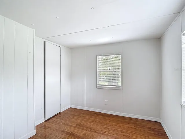 a view of entryway with wooden floor