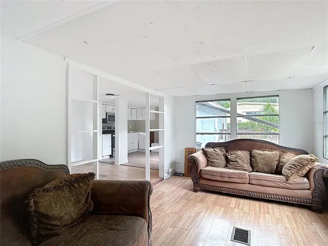 a living room with furniture and a couch