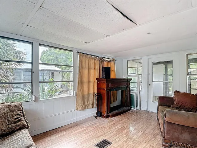 a living room with furniture and a window
