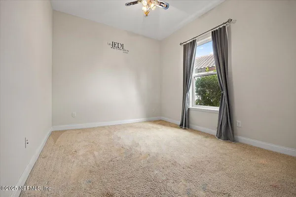 a view of a room with a window