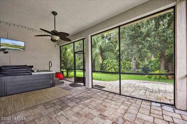 a view of empty room with windows
