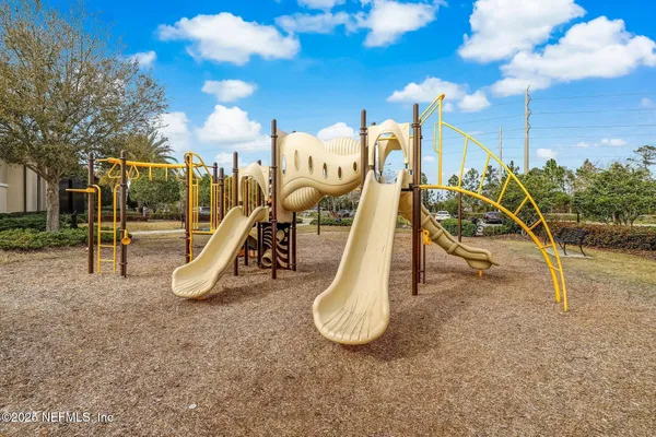 a view of a park with swings
