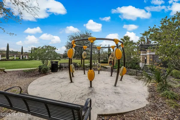 a view of a park with swings