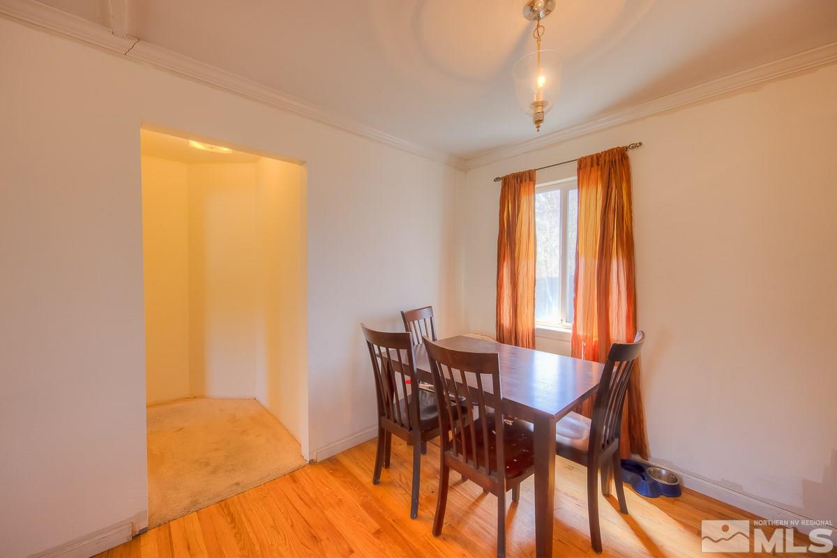 895 Cherry Lane Reno, NV 89509 - Photo 5 of 26 a view of a dining room with furniture and a window