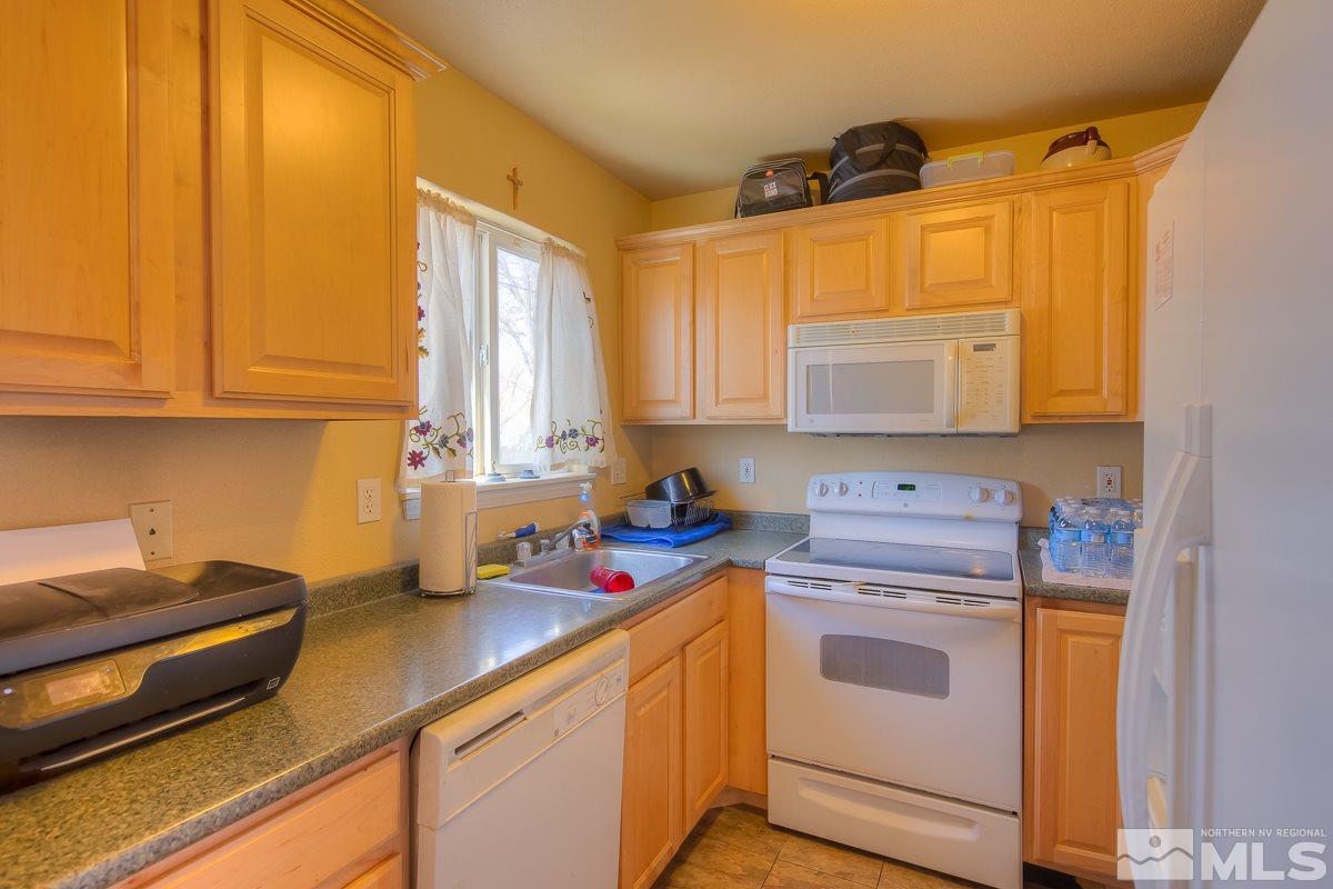 895 Cherry Lane Reno, NV 89509 - Photo 6 of 26 a view of a kitchen with sink and cabinets