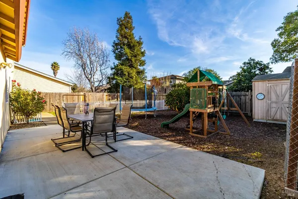 a view of a outdoor space with a patio