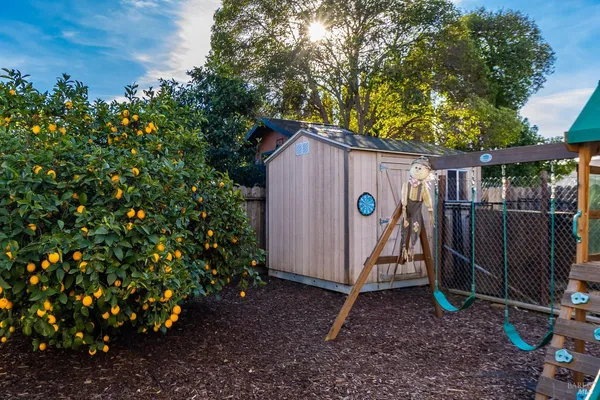 a view of a backyard with a barn