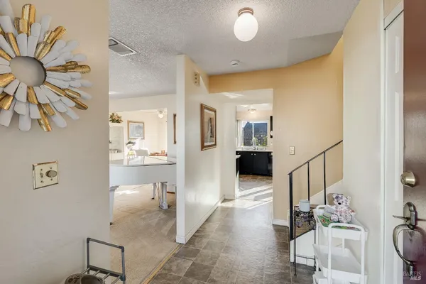 a living room with furniture and a table