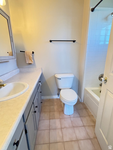 798 South 600 East Payson, UT 84651 - Photo 23 of 31 Bathroom featuring a single vanity with light-toned countertop, a drop-in sink, and painted cabinetry with dark hardware