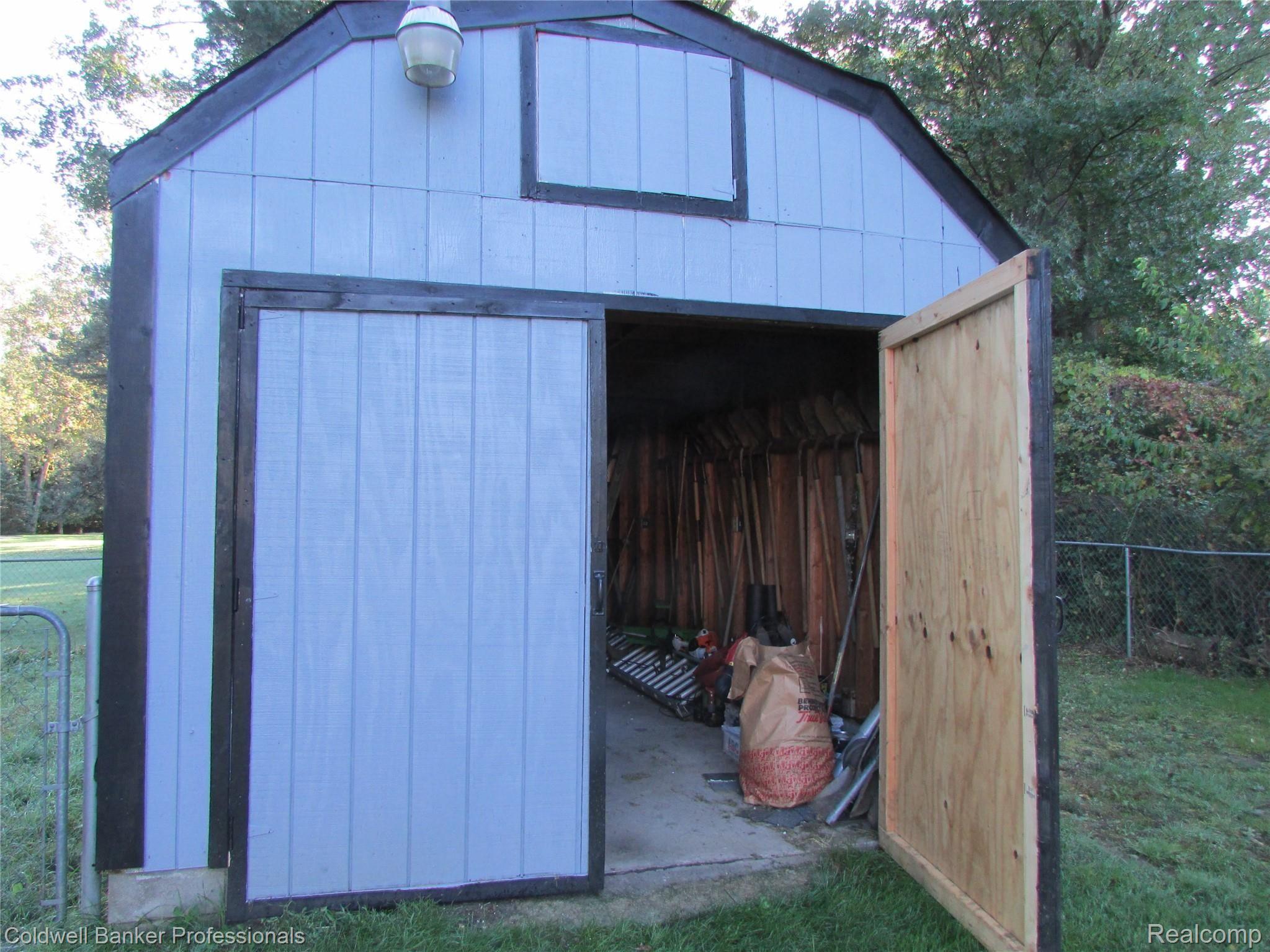 260 North Tipsico Lake Road Highland, MI 48357 - Photo 30 of 33 front shed .jpg