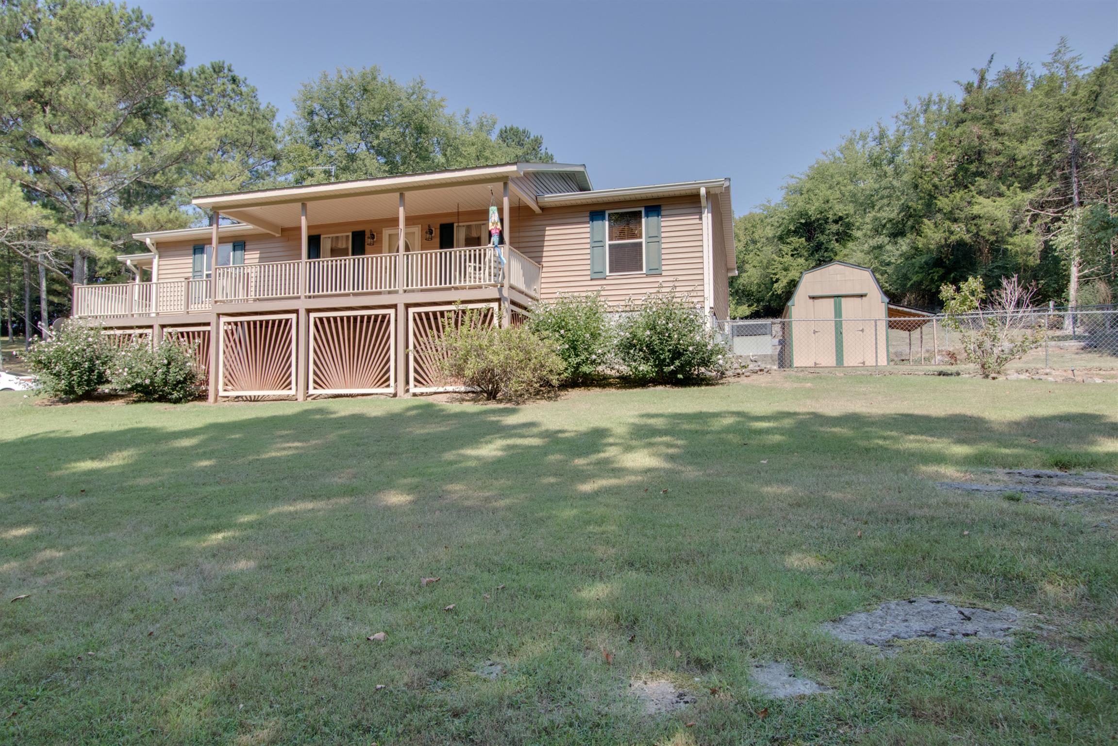 200 East Buffalo Road Carthage, TN 37030 - Photo 2 of 30 a front view of a house with a yard