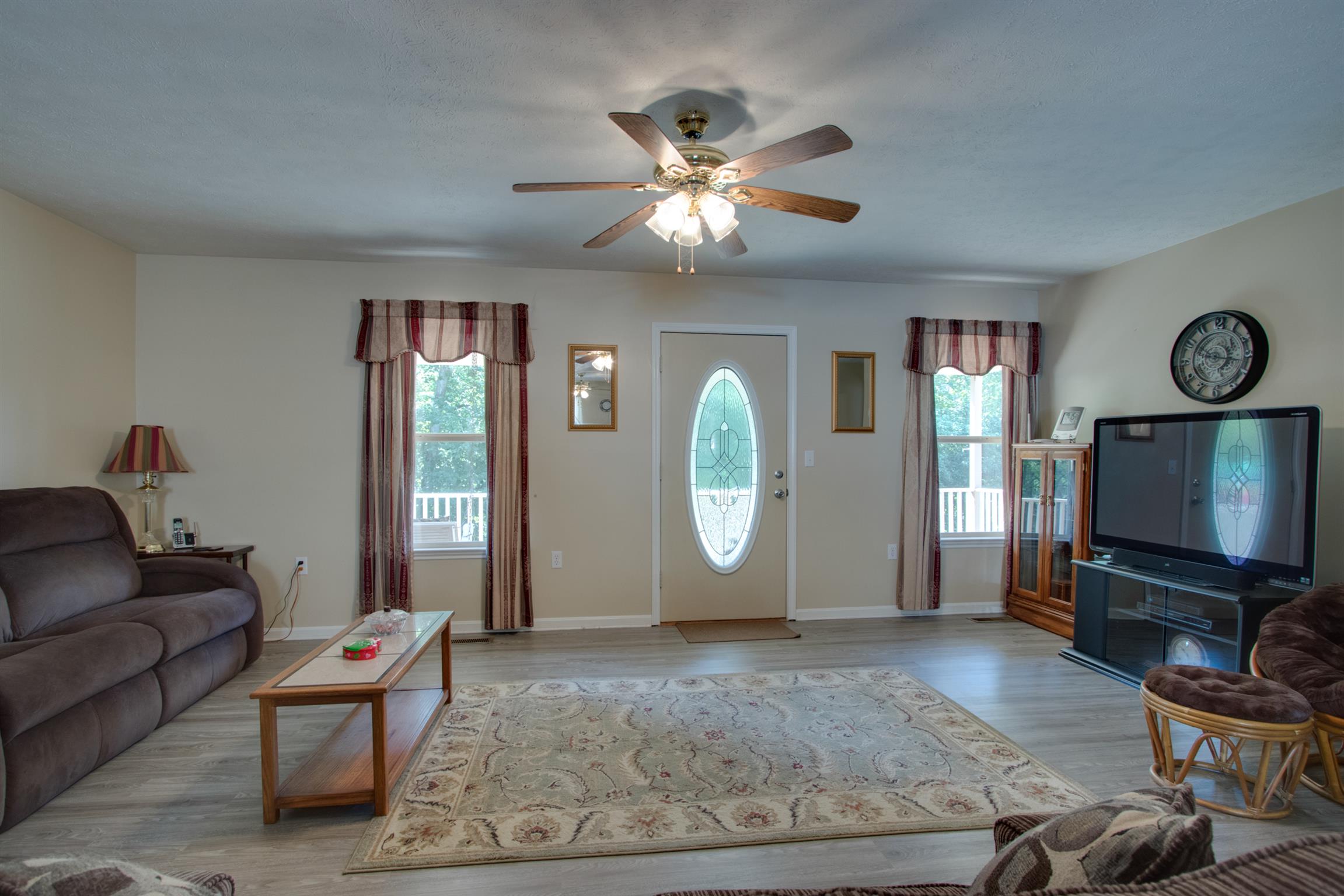 200 East Buffalo Road Carthage, TN 37030 - Photo 5 of 30 a living room with furniture and a flat screen tv