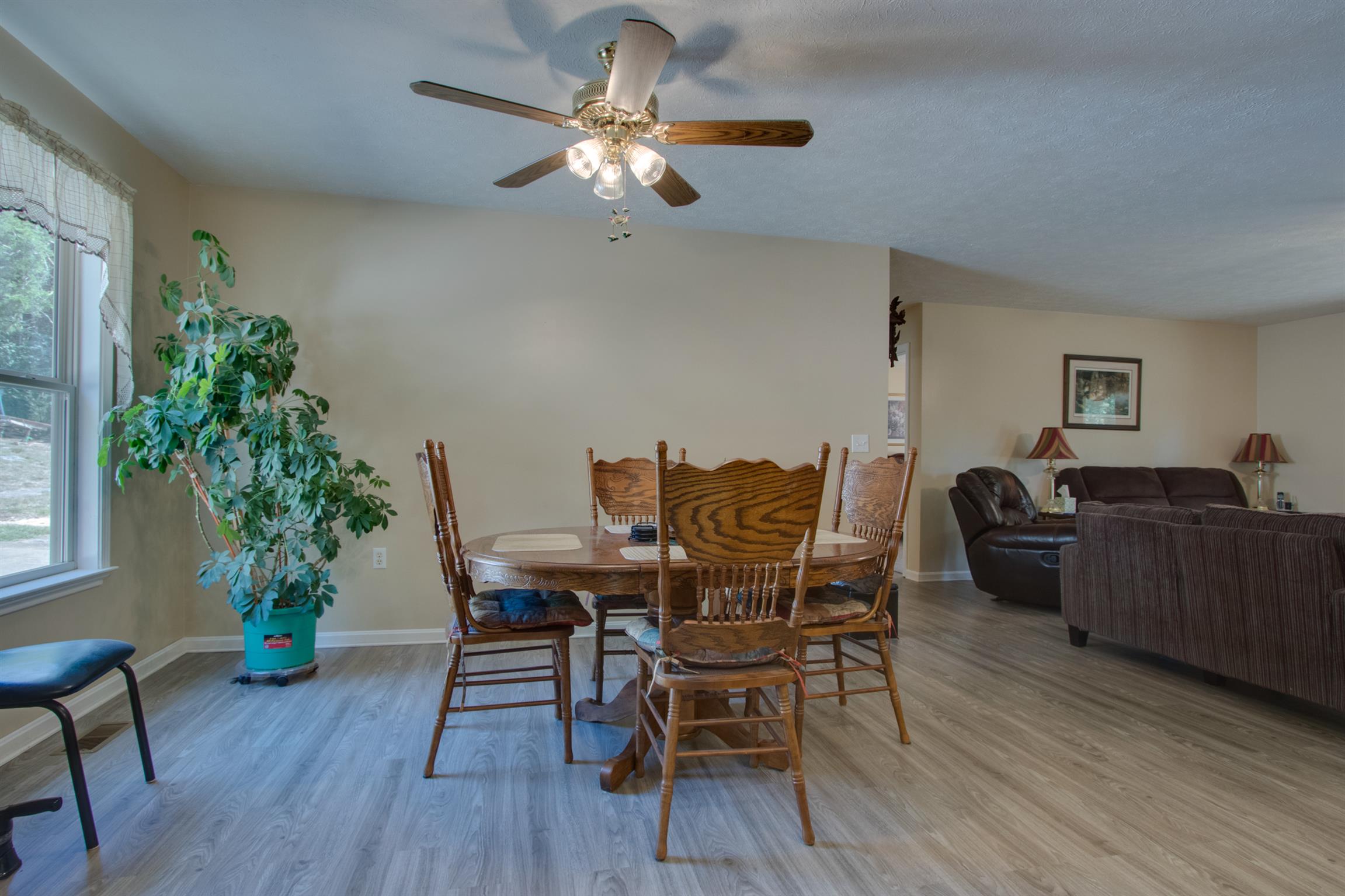 200 East Buffalo Road Carthage, TN 37030 - Photo 7 of 30 a view of a dining room with furniture and wooden floor