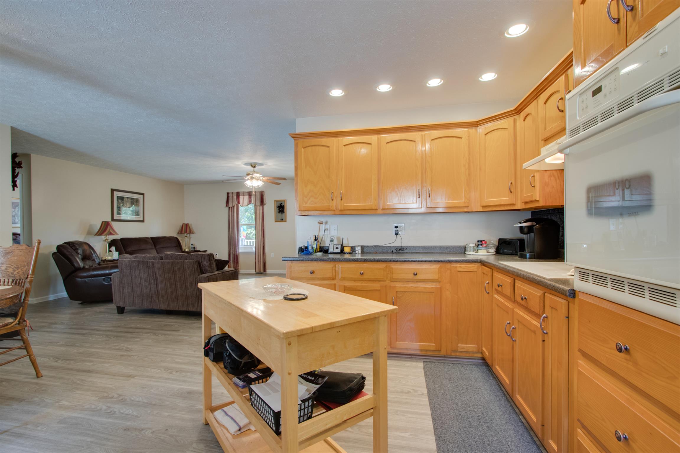200 East Buffalo Road Carthage, TN 37030 - Photo 10 of 30 a kitchen with stainless steel appliances a stove a sink cabinets and a couch