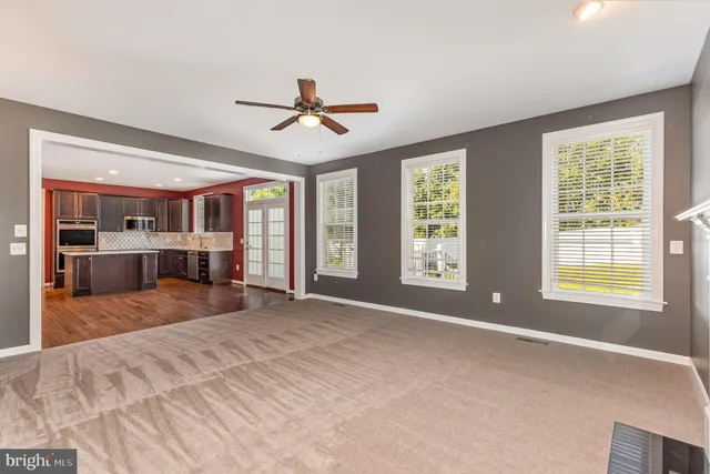 a big room with windows and closet