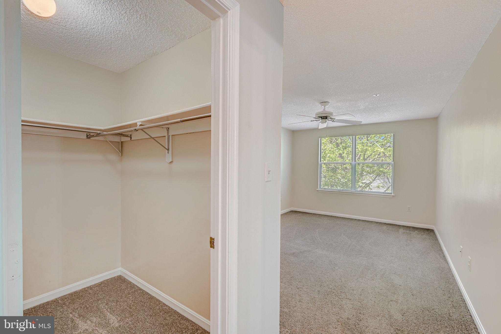 12903 Churchill Ridge Circle, Unit 6 Germantown, MD 20874 - Photo 26 of 36 a view of an empty room with a window