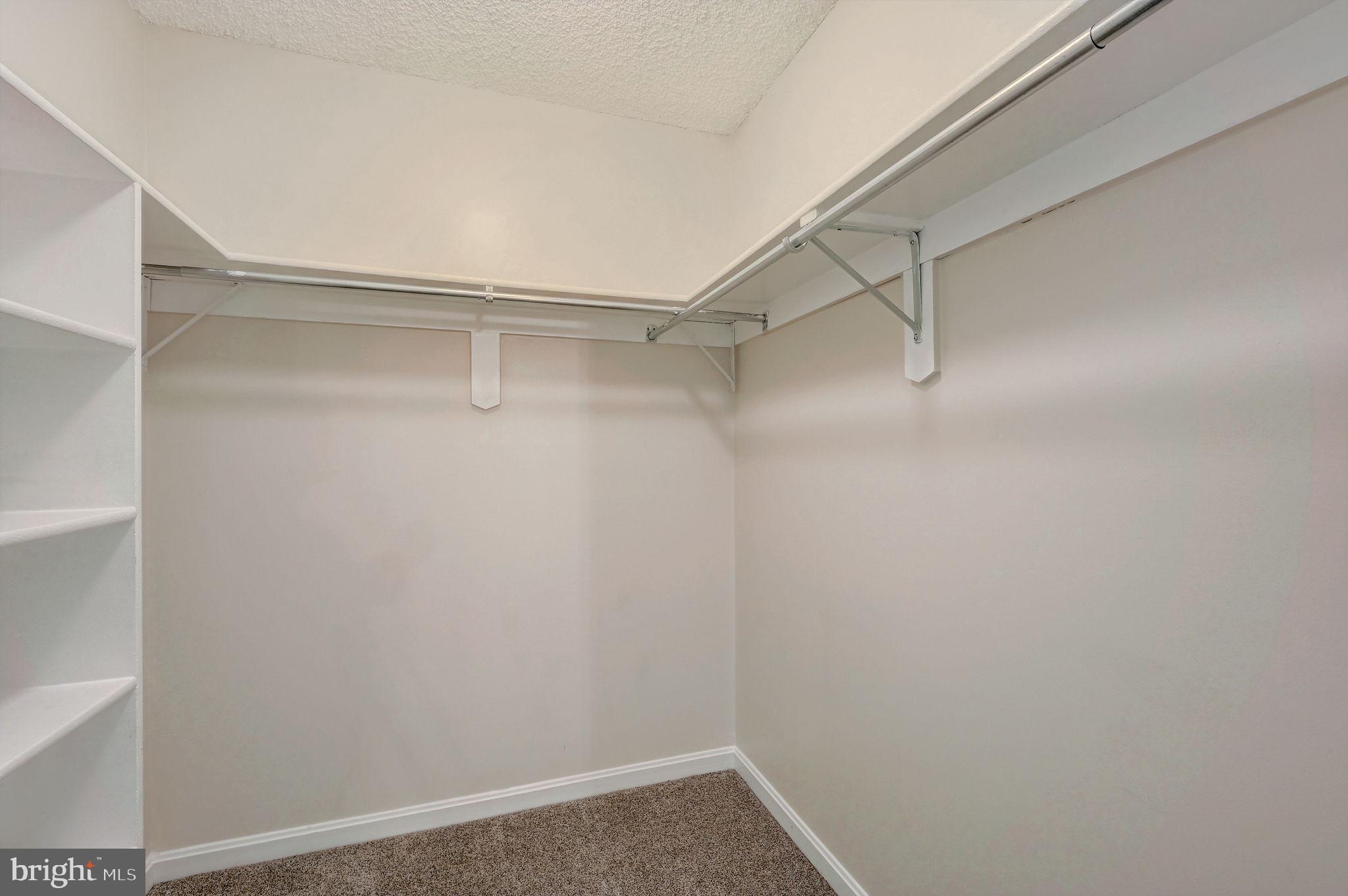 12903 Churchill Ridge Circle, Unit 6 Germantown, MD 20874 - Photo 27 of 36 a view of an empty walk in closet
