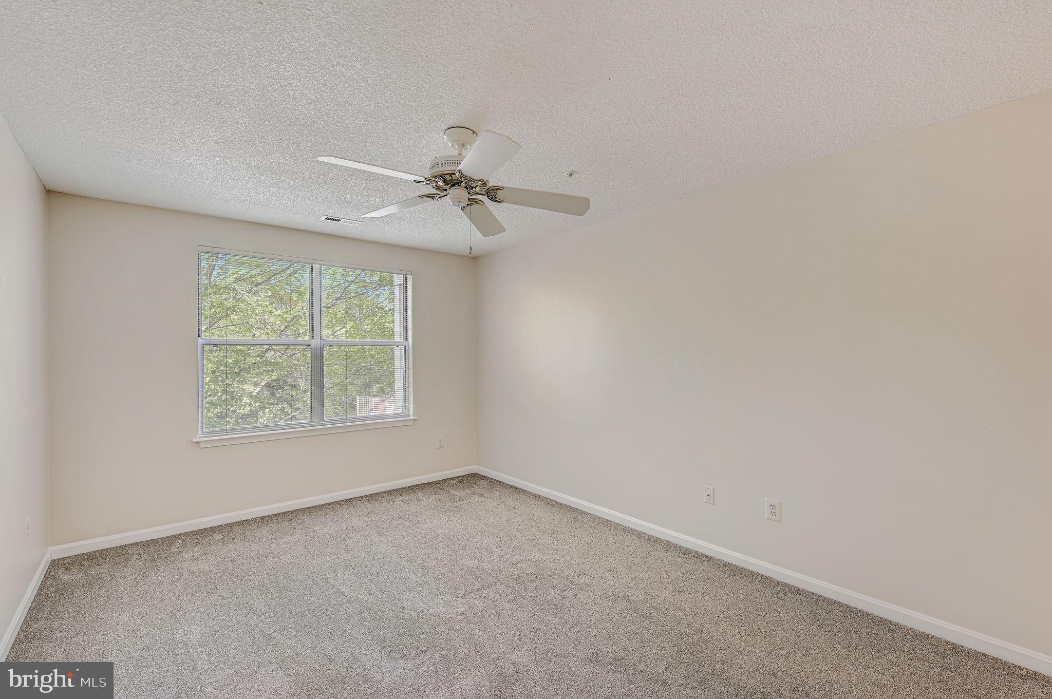 12903 Churchill Ridge Circle, Unit 6 Germantown, MD 20874 - Photo 29 of 36 an empty room with a window