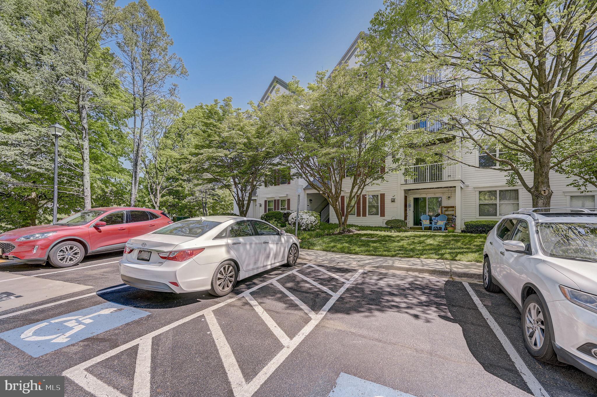 12903 Churchill Ridge Circle, Unit 6 Germantown, MD 20874 - Photo 36 of 36 a view of a car parked in front of a house