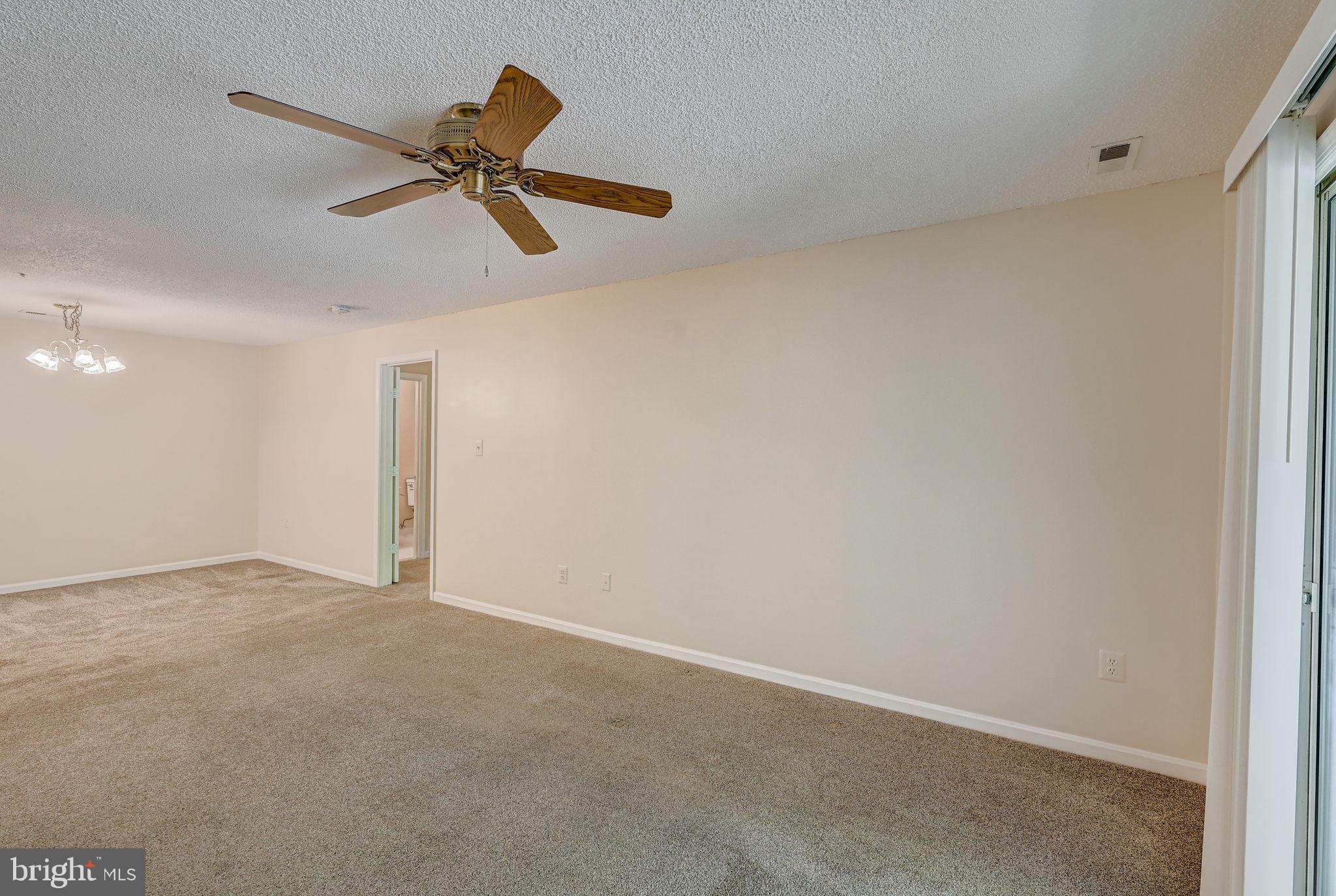 12903 Churchill Ridge Circle, Unit 6 Germantown, MD 20874 - Photo 8 of 36 a view of an empty room