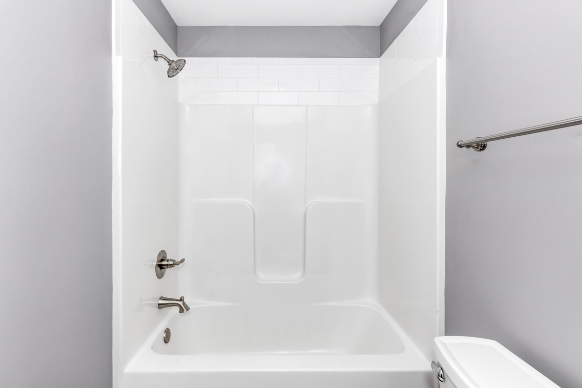 28600 Reyer Road Ardmore, AL 35739 - Photo 26 of 28 a white bath tub sitting next to a white toilet