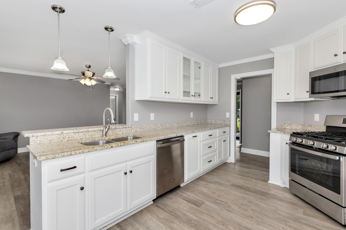 28600 Reyer Road Ardmore, AL 35739 - Photo 6 of 28 a kitchen with a white cabinets and sink